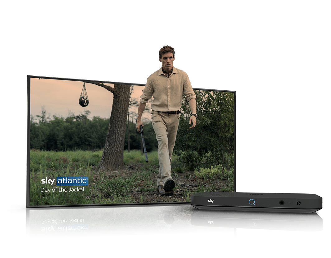 Character from the TV show the Jackal walking out from a TV frame